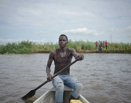 Dut Arep, a fisherman near Bor in South Sudan, bought a fishing net with a loan from SPARK